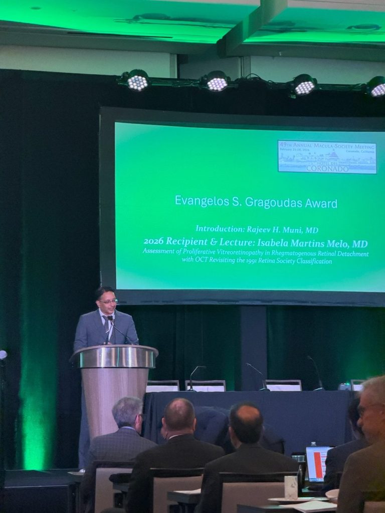 A person standing in front of a podium AI-generated content may be incorrect.